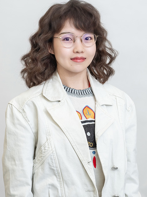 Portrait photograph of staff member, Wenjie Chen